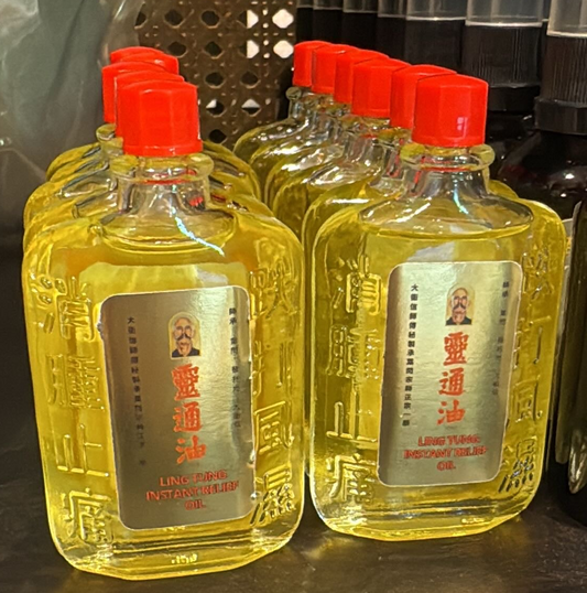 Bottles of Ling Tung Yao with red caps
